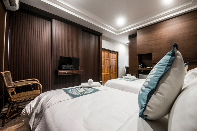 Imagen de la habitación del Hotel Amara Villa Khao Ka Lok. Foto 22