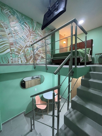 Imagen de la habitación del Hotel Amaranto Suites. Foto 5