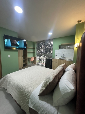 Imagen de la habitación del Hotel Amaranto Suites. Foto 7