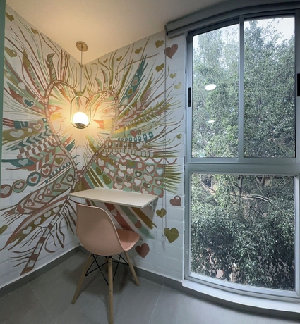 Imagen de la habitación del Hotel Amaranto Suites. Foto 9