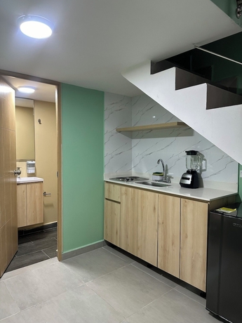 Imagen de la habitación del Hotel Amaranto Suites. Foto 11
