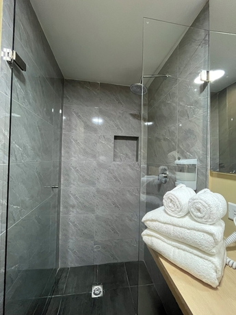 Imagen de la habitación del Hotel Amaranto Suites. Foto 14