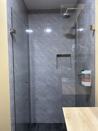 Imagen de la habitación del Hotel Amaranto Suites. Foto 15