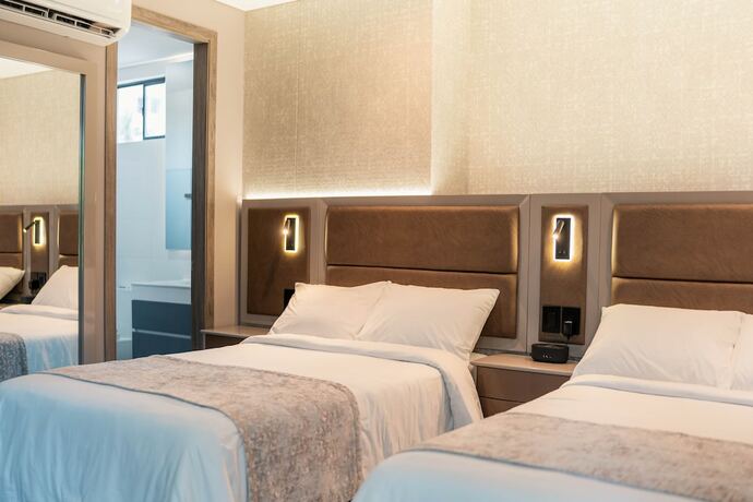 Imagen de la habitación del Hotel Amari Living Suites. Foto 15