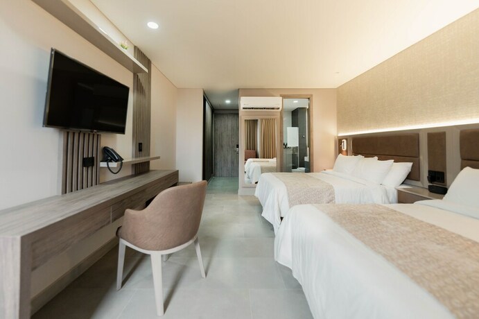Imagen de la habitación del Hotel Amari Living Suites. Foto 20