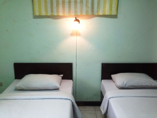 Imagen de la habitación del Hotel Amarin Inn. Foto 15