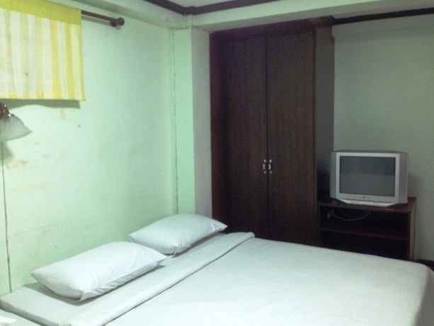 Imagen de la habitación del Hotel Amarin Inn. Foto 16