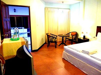 Imagen de la habitación del Hotel Amarin Patong. Foto 10