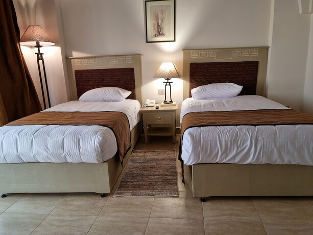 Imagen de la habitación del Hotel Amarina Queen Resort & Aqua Park Marsa Alam. Foto 14