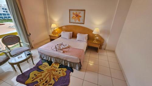 Imagen de la habitación del Hotel Amarina Sun Resort & Aqua Park Sharm El-Sheikh. Foto 15