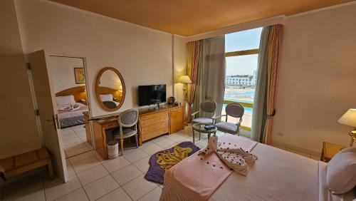 Imagen de la habitación del Hotel Amarina Sun Resort & Aqua Park Sharm El-Sheikh. Foto 16