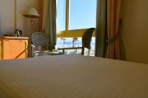 Imagen de la habitación del Hotel Amarina Sun Resort & Aqua Park Sharm El-Sheikh. Foto 18