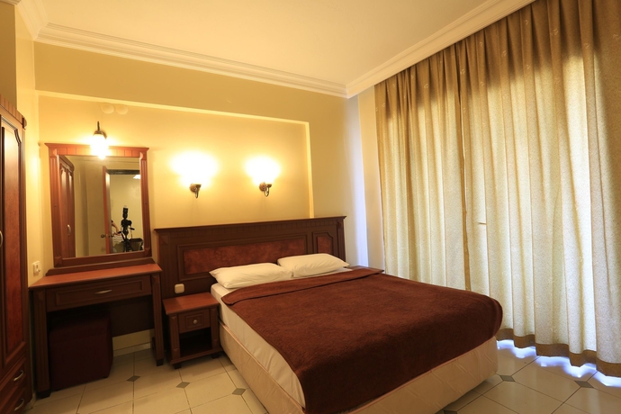Imagen de la habitación del Hotel Amaris Apartments. Foto 4