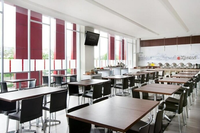Imagen del bar/restaurante del Hotel Amaris Pettarani - Makassar. Foto 17