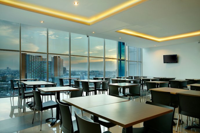 Imagen del bar/restaurante del Hotel Amaris Seasons City - Chse Certified. Foto 4