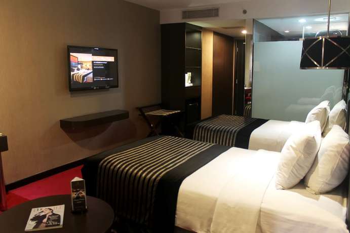 Imagen de la habitación del Hotel Amaroossa Cosmo Jakarta. Foto 11