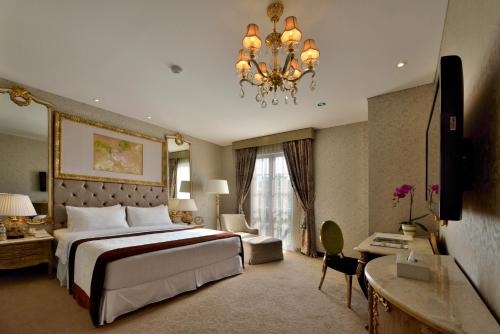 Imagen de la habitación del Hotel Amaroossa Royal. Foto 7