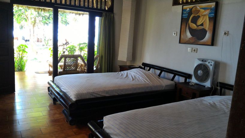 Imagen de la habitación del Hotel Amarta Beach Cottages. Foto 6