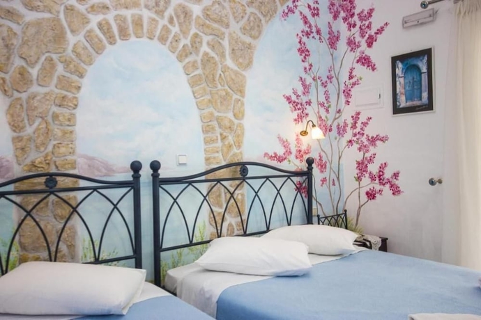 Imagen de la habitación del Hotel Amaryllis Studios. Foto 12