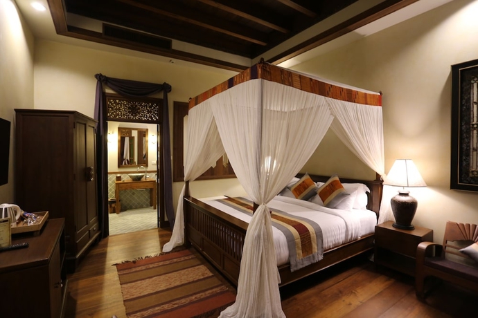 Imagen de la habitación del Hotel Amata Lanna Village. Foto 2