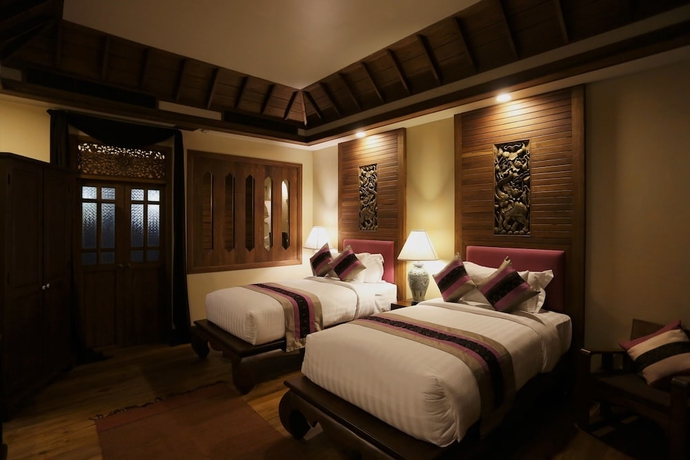 Imagen de la habitación del Hotel Amata Lanna Village. Foto 5