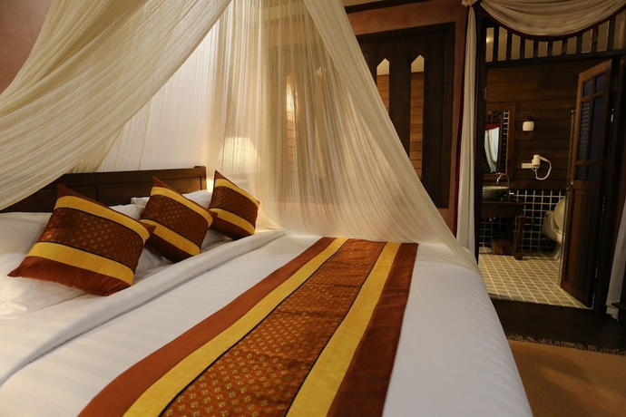 Imagen de la habitación del Hotel Amata Lanna Village. Foto 6