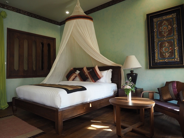 Imagen de la habitación del Hotel Amata Lanna Village. Foto 8
