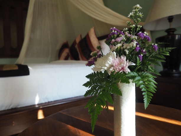 Imagen de la habitación del Hotel Amata Lanna Village. Foto 9