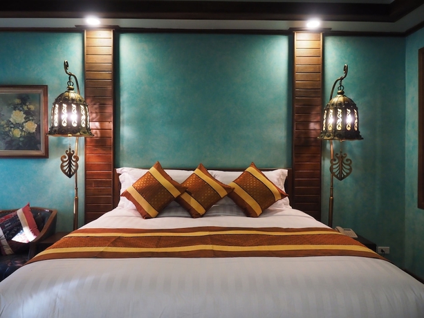 Imagen de la habitación del Hotel Amata Lanna Village. Foto 10