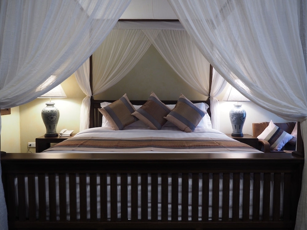 Imagen de la habitación del Hotel Amata Lanna Village. Foto 12