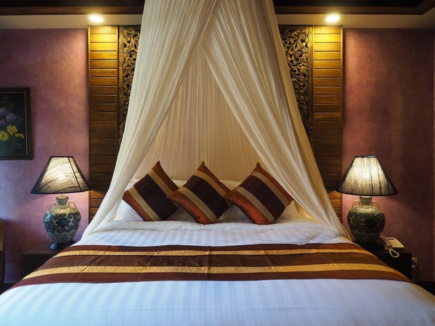 Imagen de la habitación del Hotel Amata Lanna Village. Foto 13