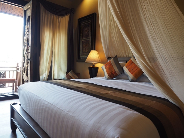 Imagen de la habitación del Hotel Amata Lanna Village. Foto 14