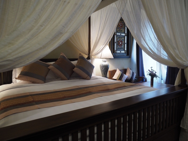 Imagen de la habitación del Hotel Amata Lanna Village. Foto 15