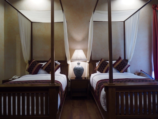 Imagen de la habitación del Hotel Amata Lanna Village. Foto 18