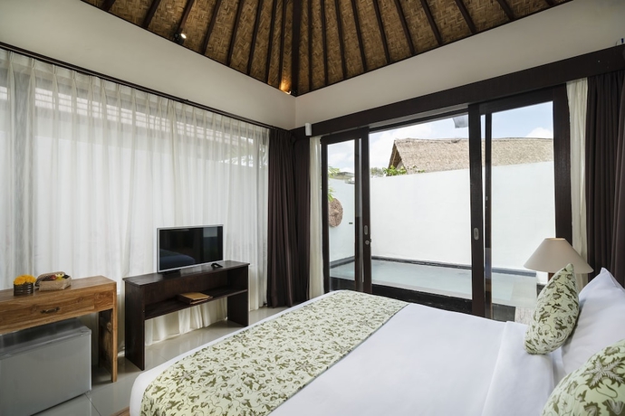 Imagen de la habitación del Hotel Amatara Abirama Villas. Foto 2