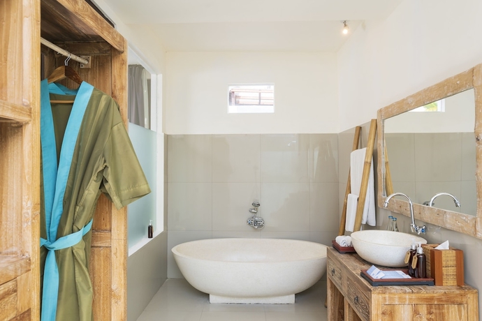 Imagen de la habitación del Hotel Amatara Abirama Villas. Foto 9