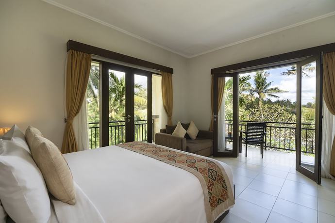 Imagen de la habitación del Hotel Amatara Agung Raka. Foto 11