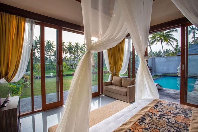 Imagen de la habitación del Hotel Amatara Agung Raka. Foto 16