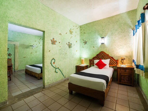 Imagen de la habitación del Hotel Amatlan De Quetzalc&oacute;atl. Foto 3