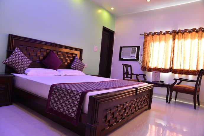 Imagen de la habitación del Hotel Amax Inn. Foto 10