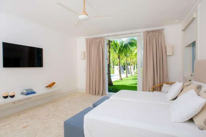 Imagen general del Hotel Amazing Golf Villa at Luxury Resort in Punta Cana Includes Staff Golf Carts and Bikes. Foto 4