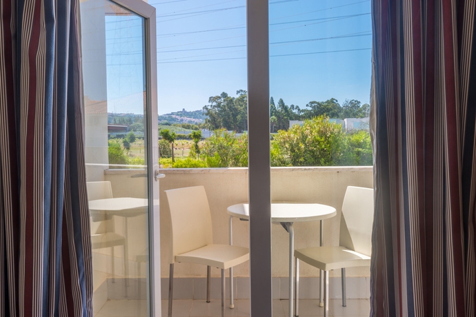 Imagen de la habitación del Hotel Amazonia Palmela Apartamentos Turísticos. Foto 6