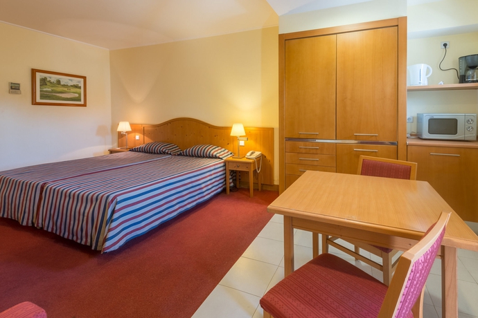 Imagen de la habitación del Hotel Amazonia Palmela Apartamentos Turísticos. Foto 11