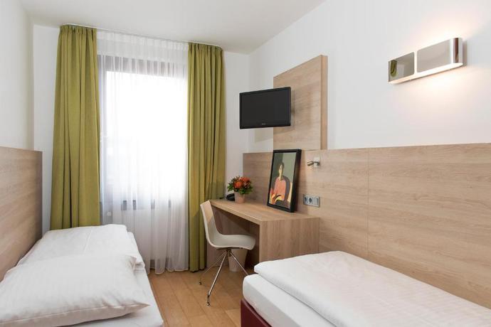 Imagen de la habitación del Hotel Amba, Munich. Foto 7