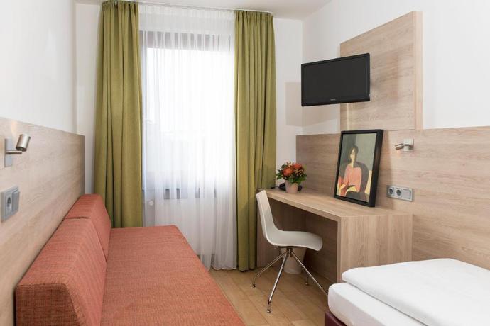 Imagen de la habitación del Hotel Amba, Munich. Foto 10
