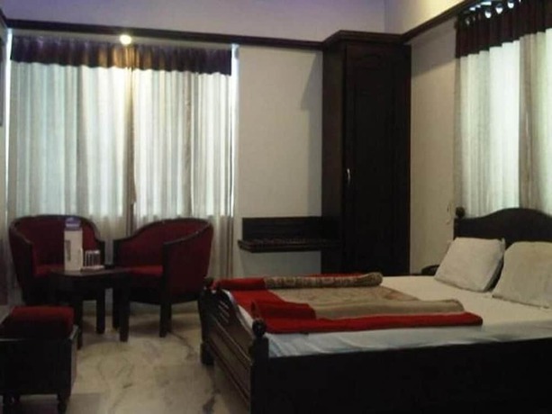 Imagen de la habitación del Hotel Ambaji International. Foto 11