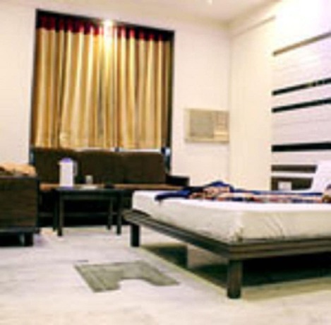 Imagen de la habitación del Hotel Ambaji International. Foto 12