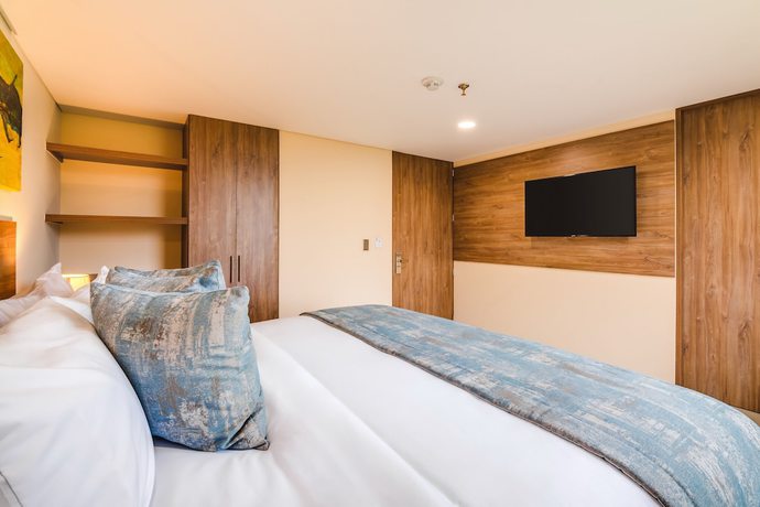 Imagen de la habitación del Hotel Ambar Boutique Cali. Foto 9