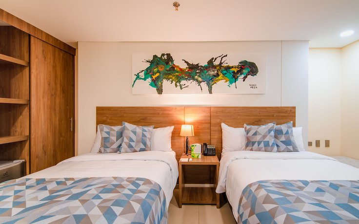 Imagen de la habitación del Hotel Ambar Boutique Cali. Foto 16