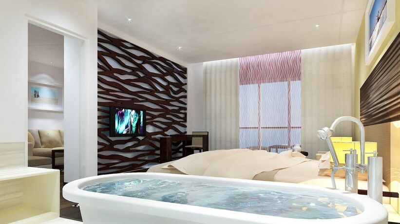 Imagen de la habitación del Hotel Ambar Sarovar Portico. Foto 15